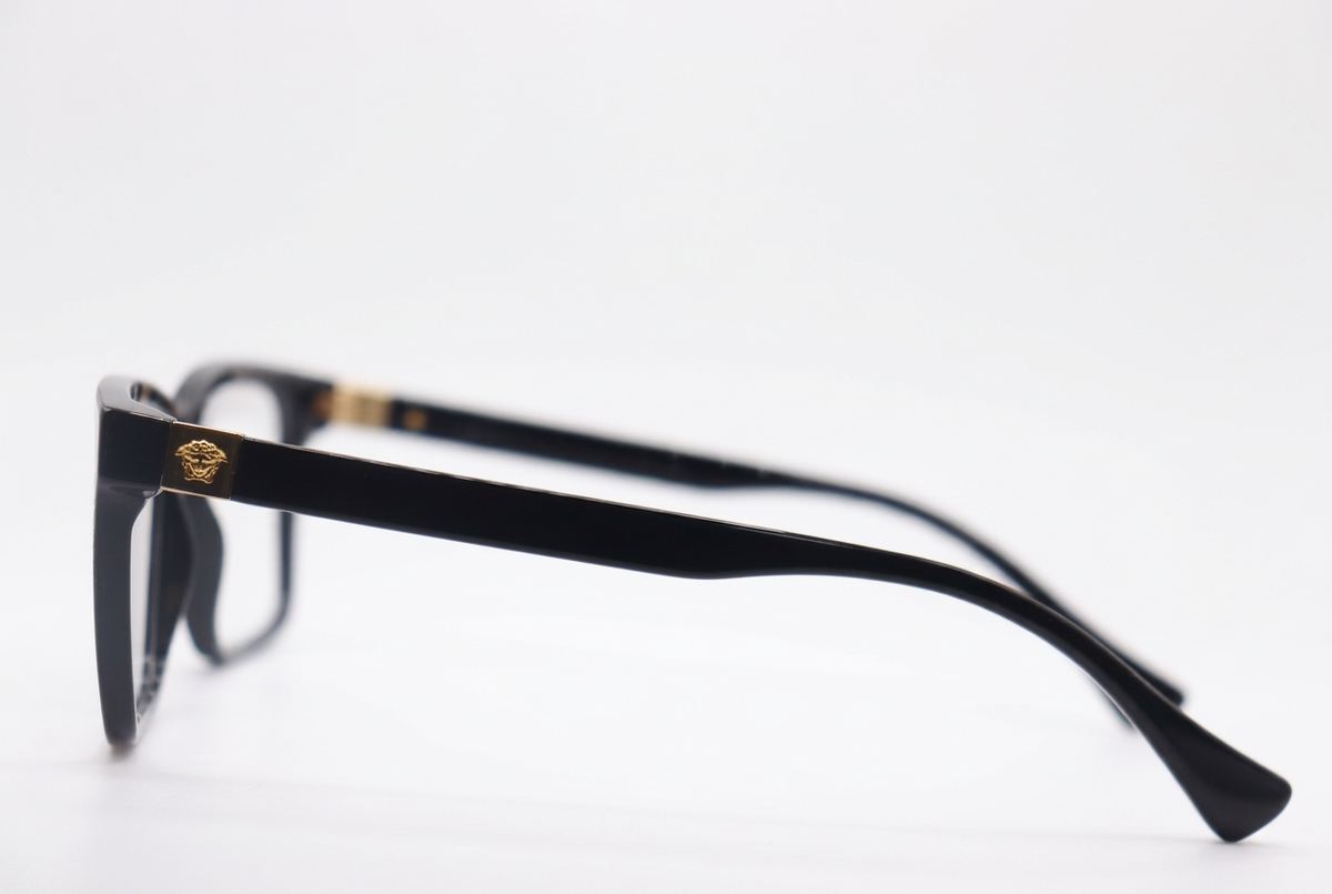 Black Versace MOD 3328 eyeglasses, side view on white background