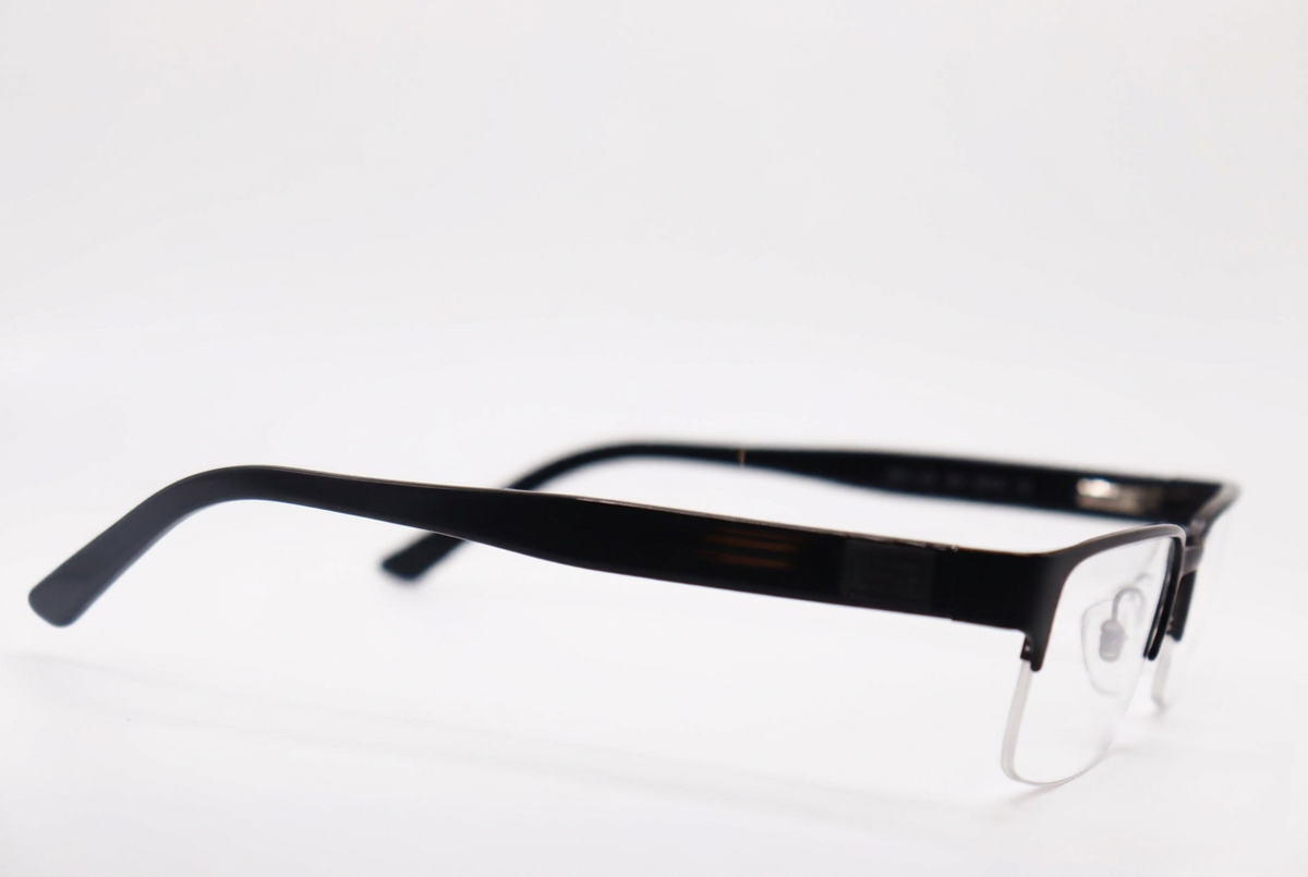 Versace MOD 1184 black semi-rimless eyeglasses, side angle on white background